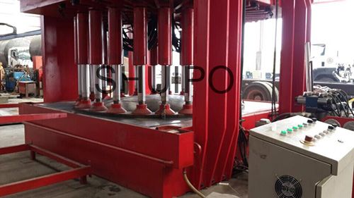 Hydraulic dished head configuring machine